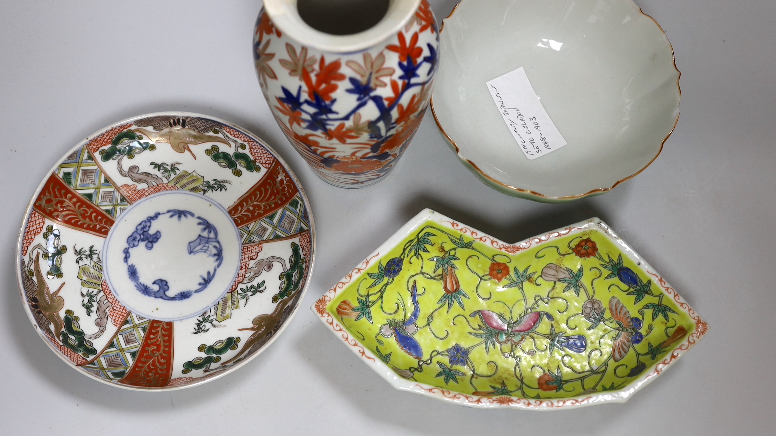 A Japanese Imari vase, a dish and green glazed bowl, together with a Chinese hors d'oeuvres dish-24cm wide